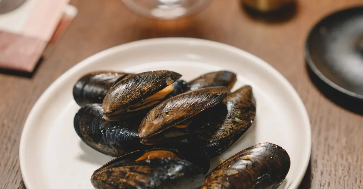 découvrez notre sélection délicieuse de moules fraîches, idéales pour des recettes savoureuses et faciles à préparer.